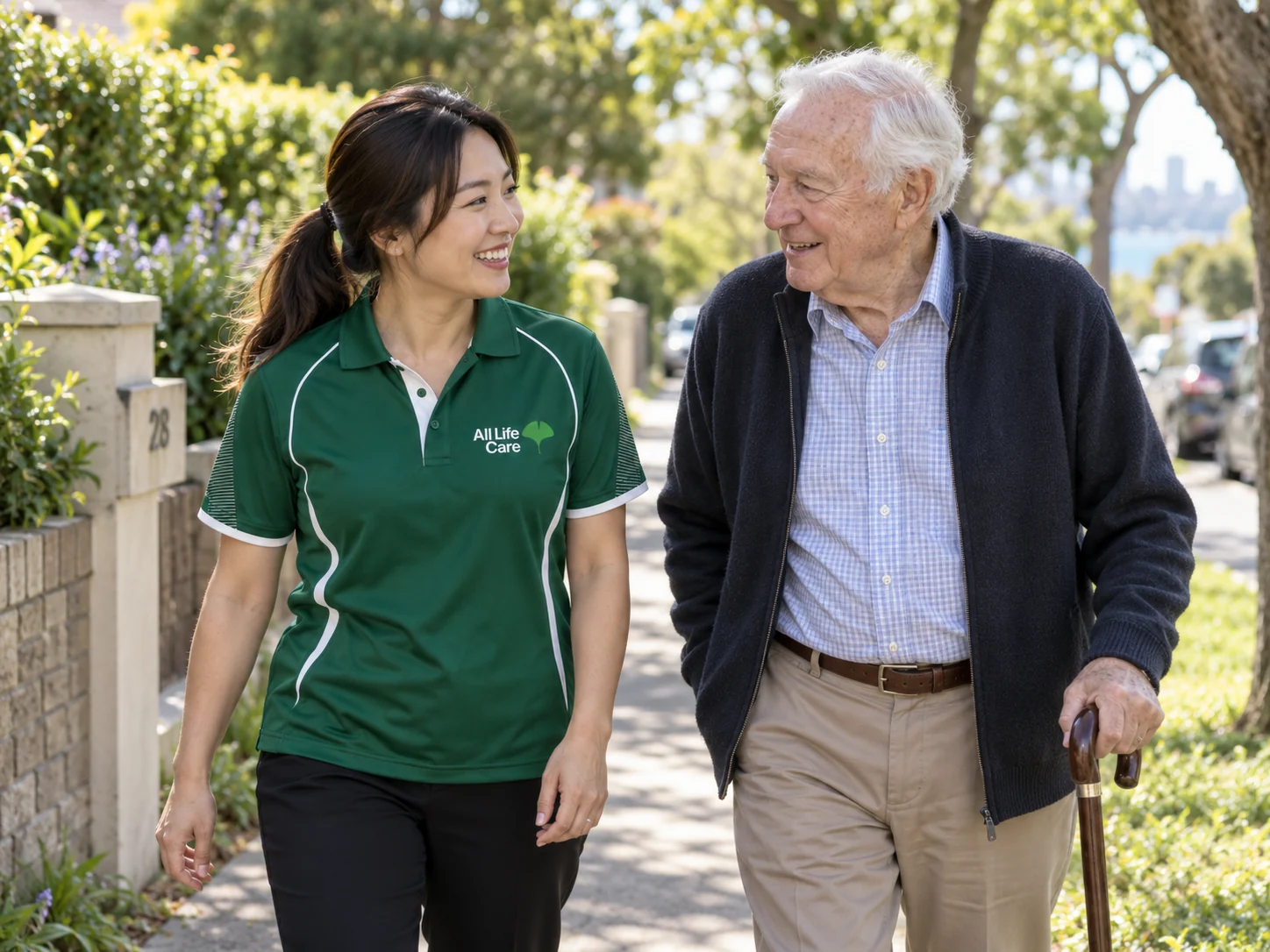 All Life Care support worker walking alongside an older man using a cane